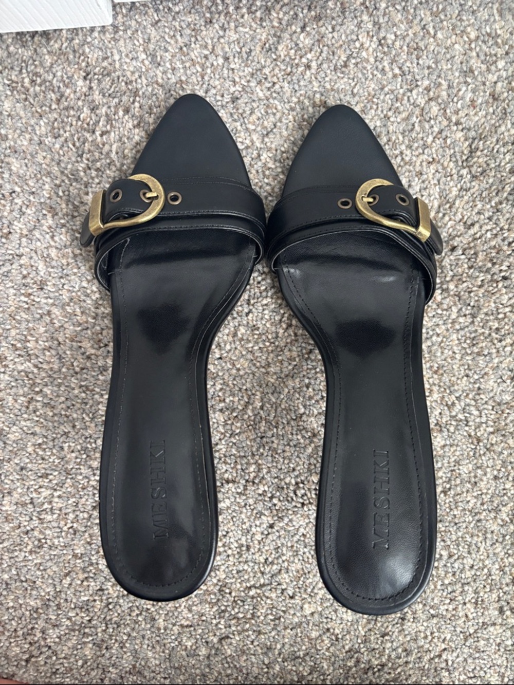 Meshki Black Pointed Toe Slide Mules with Gold Buckle